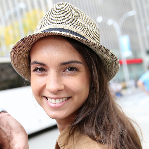 Portrait of cheerful couple doing shopping in Manhattan